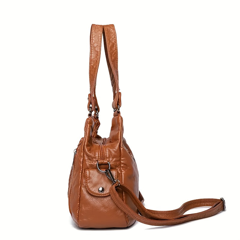 luxury handbag women featuring multiple pockets a designer